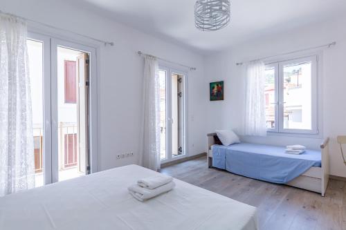 Ένα ή περισσότερα κρεβάτια σε δωμάτιο στο Andromachi Apartment
