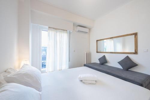 Postel nebo postele na pokoji v ubytování Athens Dreams & Suites Apartments