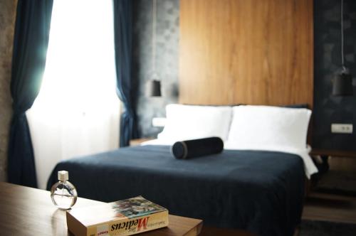 Postel nebo postele na pokoji v ubytování HVAR RIVA ROOMS 2