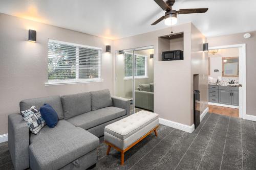 a living room with a couch and a chair at The Inn at Boatworks, Lake Tahoe in Tahoe City