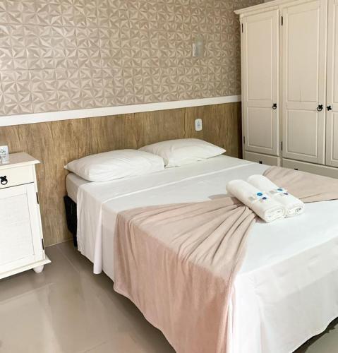 Кровать или кровати в номере Pousada Marina da Praia