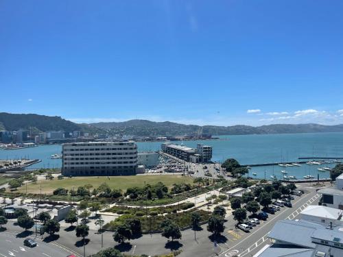 an aerial view of a city with a large building at Bay Plaza Hotel in Wellington
