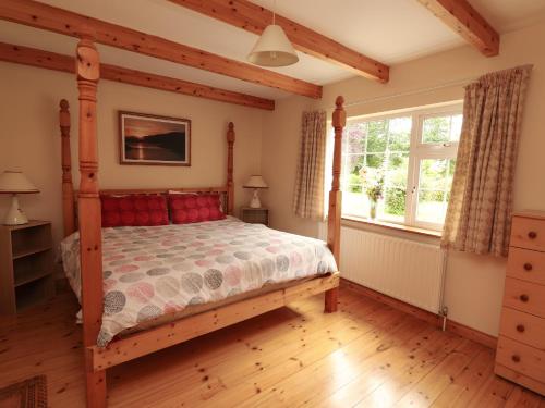 Postel nebo postele na pokoji v ubytování The Lodge