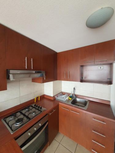 Η κουζίνα ή μικρή κουζίνα στο TADEO HEANKE DEPARTAMENTO IQUIQUE