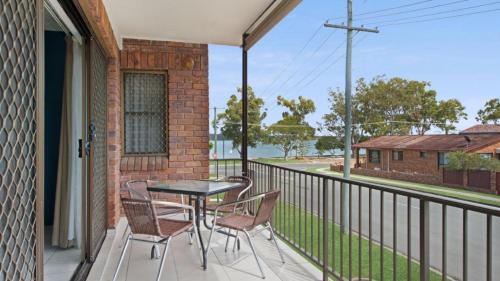 A balcony or terrace at Waterviews,Pool, Wifi its all here !- Welsby Pde, Bongaree