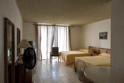 Montego Bay Club Beach Resortにあるベッド