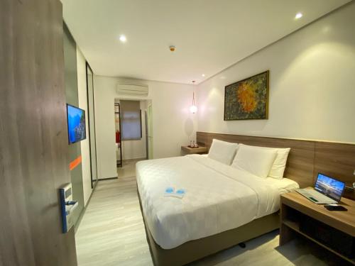 Postel nebo postele na pokoji v ubytování Go Hotels Plus Tuguegarao
