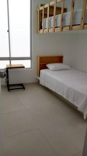 Postel nebo postele na pokoji v ubytování Agradable casa de Playa en Chinchaycamac