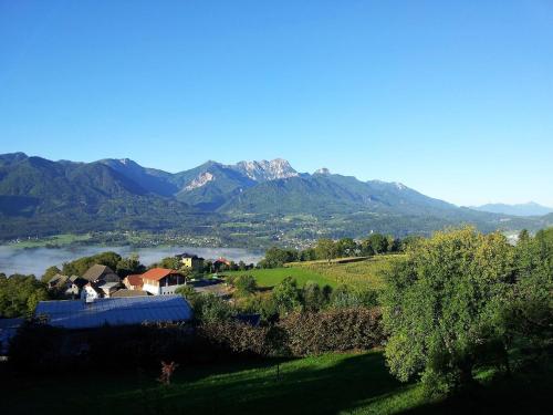 a view of a valley with mountains in the background at Holiday home in Ludmannsdorf near W rthersee in Ludmannsdorf