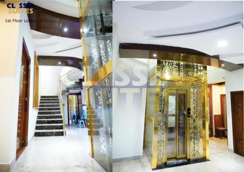a lobby of a building with a glass door at Classia Suites in Bengaluru