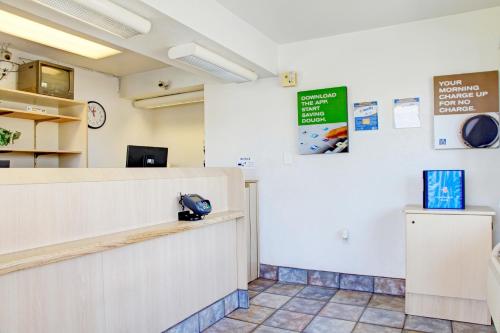 a waiting room at a hospital with a counter at Motel 6-Tempe, AZ - Broadway - ASU in Tempe