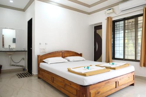 Postel nebo postele na pokoji v ubytování Hotel Chivla Paradise