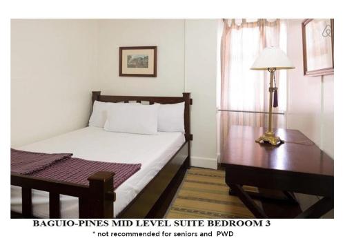 Postel nebo postele na pokoji v ubytování Agreeable Family Baguio Suites