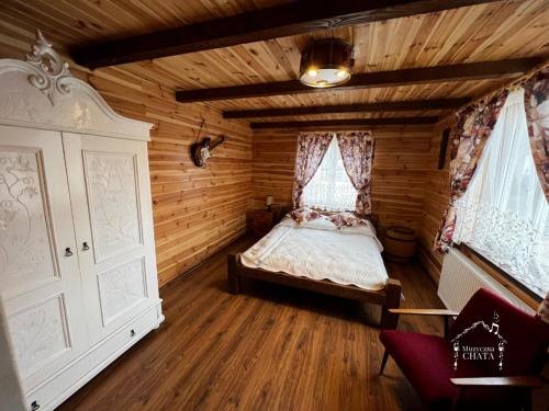 Postel nebo postele na pokoji v ubytování Bieszczady Noclegi "Muzyczna Chata"