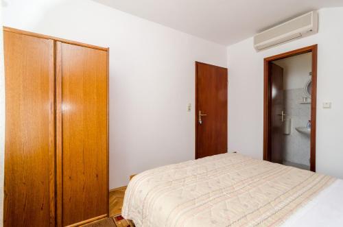Postel nebo postele na pokoji v ubytování Guesthouse Moretic