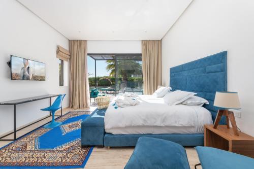 Katil atau katil-katil dalam bilik di Les Iris - Peaceful villa with heated private pool & hammam