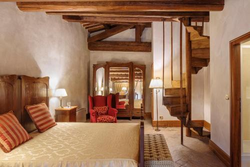 Katil atau katil-katil dalam bilik di Hotel Villa Giona