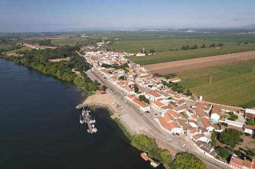 an aerial view of a town next to a river at Villa Rio by Valada Village in Valada