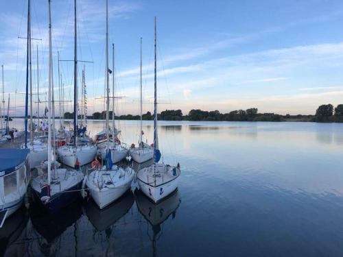 a group of boats are docked in the water at Villa Rio by Valada Village in Valada