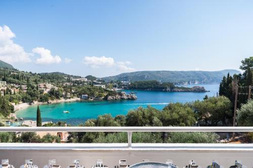 a view of a lake from a balcony at Odysseus Hotel in Paleokastritsa