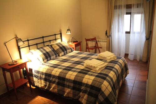 Postel nebo postele na pokoji v ubytování LA POSADA DE SOFUENTES
