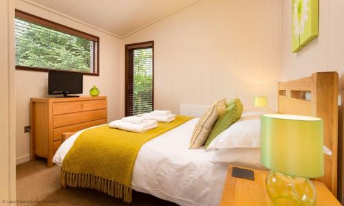 Ein Bett oder Betten in einem Zimmer der Unterkunft Thie Loghey