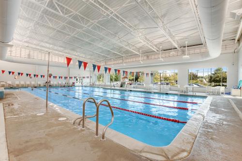 a large indoor swimming pool with a large swimming ramp at Sea Colony - 4203 Rally in Bethany Beach