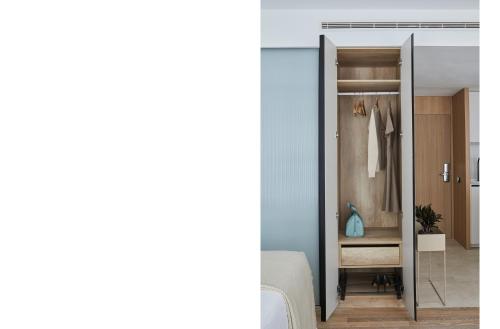 a room with a closet with a mirror at 60 Balconies Iconic in Madrid