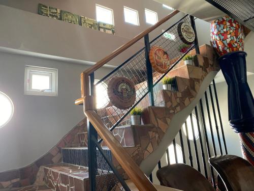 a spiral staircase in a home with a stair case at Mini Summer in Nanwan