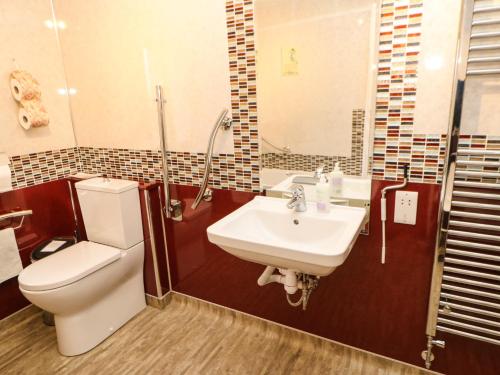 Ванная комната в Holly Lodge