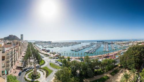 a view of a harbor with boats in the water at Ibis Hotel Alicante in Alicante
