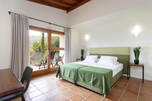 Ліжко або ліжка в номері Hotel Alta Montaña