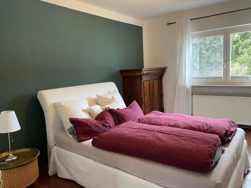Säng eller sängar i ett rum på Villa am Bach