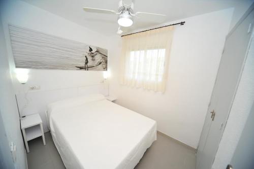 Postel nebo postele na pokoji v ubytování Apartamento Princicasim 1 dormitorio