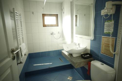 Koupelna v ubytování Hotel Agapi Mamaia