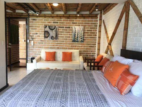 Postel nebo postele na pokoji v ubytování "Bambú Sierra" Cozzy Ecológical Lofts