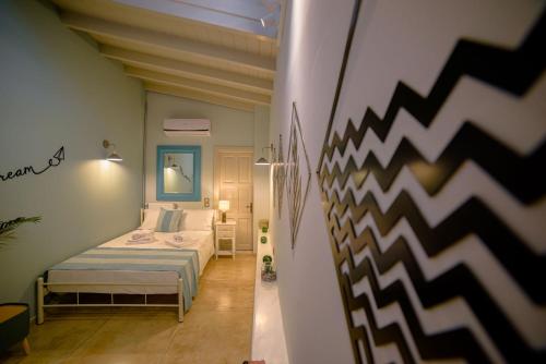 Katil atau katil-katil dalam bilik di Daedalus Luxury Home - Seaview & Heated Pool