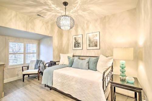 a bedroom with a bed and a table and a chair at Chic Lincoln City Retreat on Oregon Coast in Lincoln City