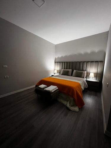 Postel nebo postele na pokoji v ubytování Bejart Apartment 1