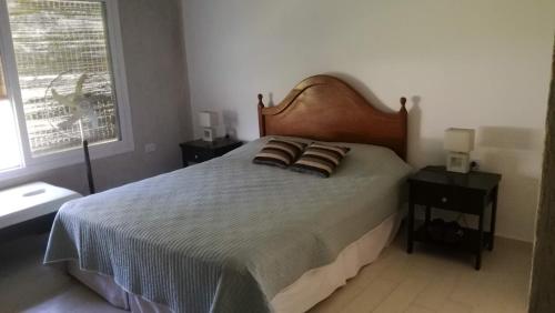 Кровать или кровати в номере Casa en el Solar de capilla