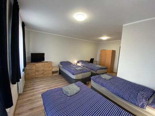 Posteľ alebo postele v izbe v ubytovaní Hotelik Nad Zalewem 10 km od Legnicy