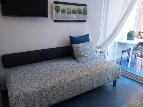 Posteľ alebo postele v izbe v ubytovaní APARTAMENTO con TERRAZA VISTAS AL MAR