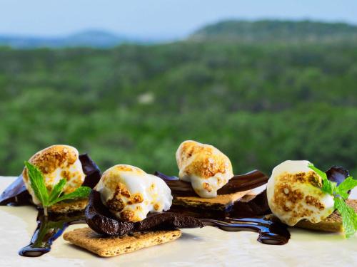 a plate of food with ice cream and cookies at Sonesta Bee Cave Austin Hill Country in Bee Cave