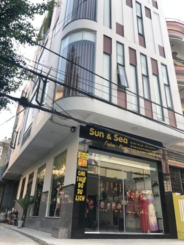 a sun and sea store in front of a building at Sun&Sea House Homestay in Quy Nhon
