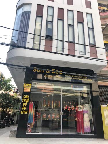 a sun and set store in front of a building at Sun&Sea House Homestay in Quy Nhon