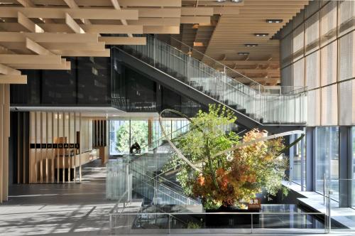 a view of the lobby of a building with a staircase at The Capitol Hotel Tokyu in Tokyo