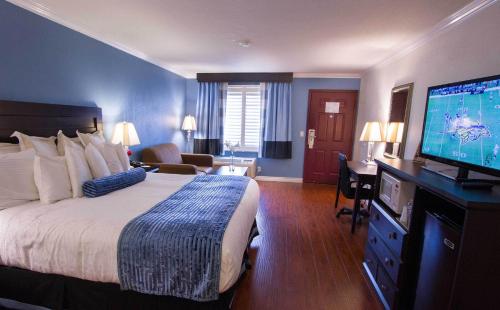 Ένα ή περισσότερα κρεβάτια σε δωμάτιο στο Regency Inn in Los Angeles