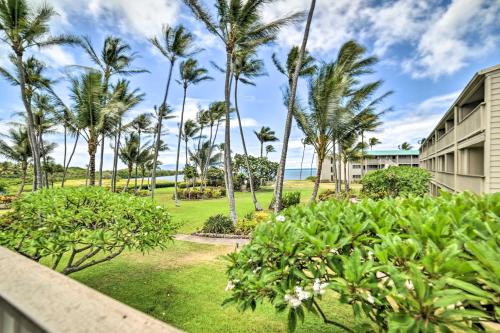 a view of the grounds of a resort with palm trees at Beach Access and Community Perks Hawaii Haven in Kaunakakai