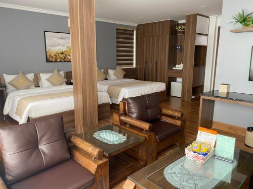 Cama ou camas em um quarto em Minh Phát Hotel