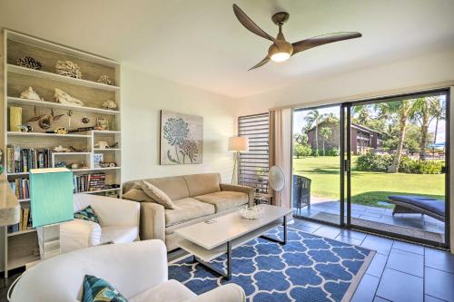 a living room with a couch and a ceiling fan at Lush Molokai Island Oasis with Private Pool and Beach! in Kaunakakai